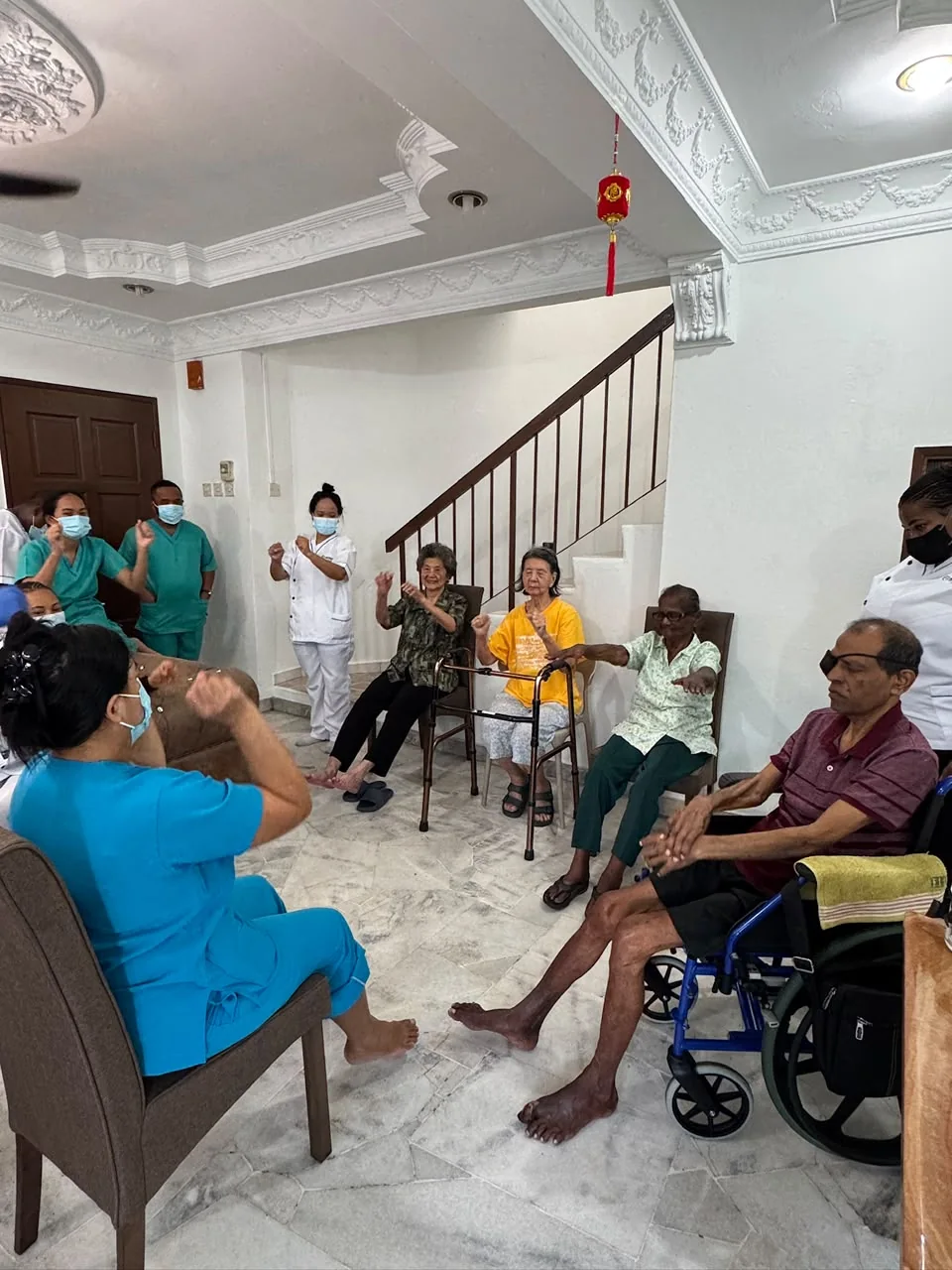 Residents taking part in gentle indoor exercise