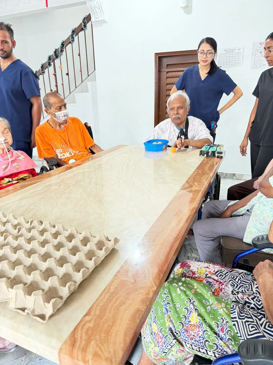 Residents taking part in a table game